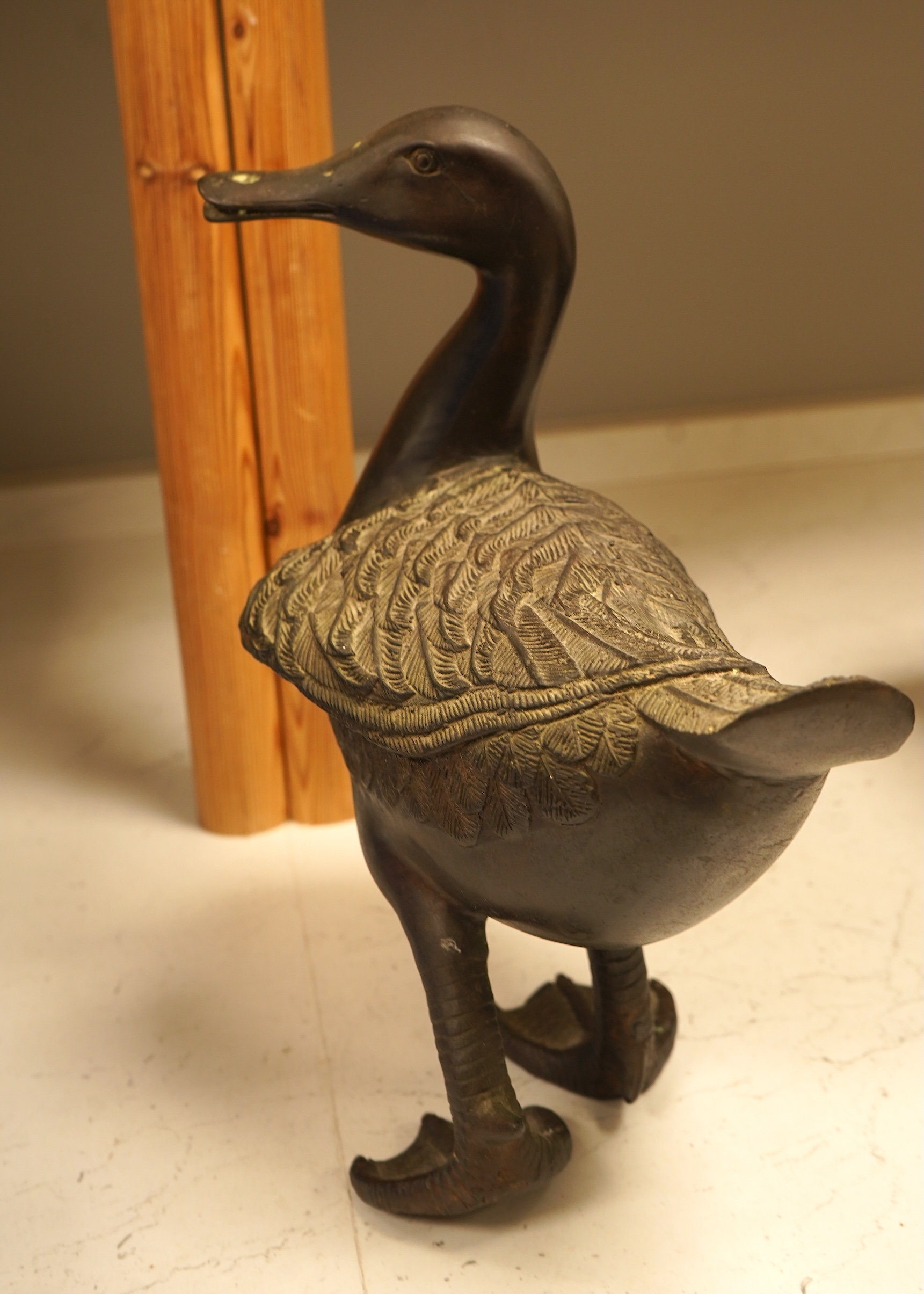 A bronze study of a duck, 30cm high